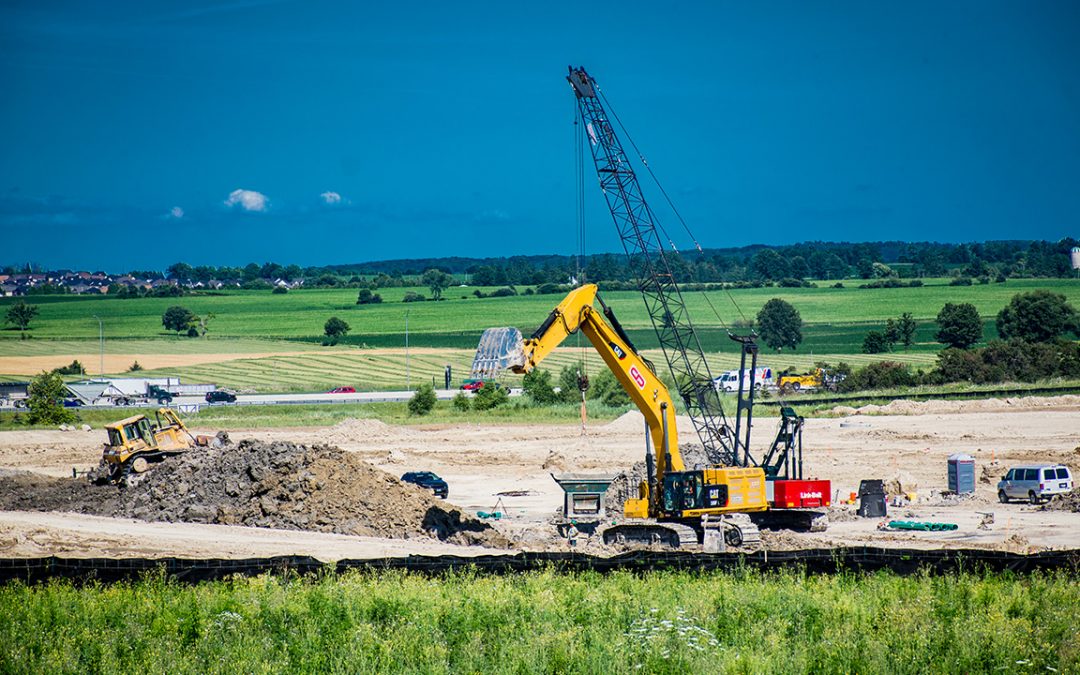 digger machine operating on construction site