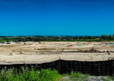 photo of an empty plot of land being prepared for construction